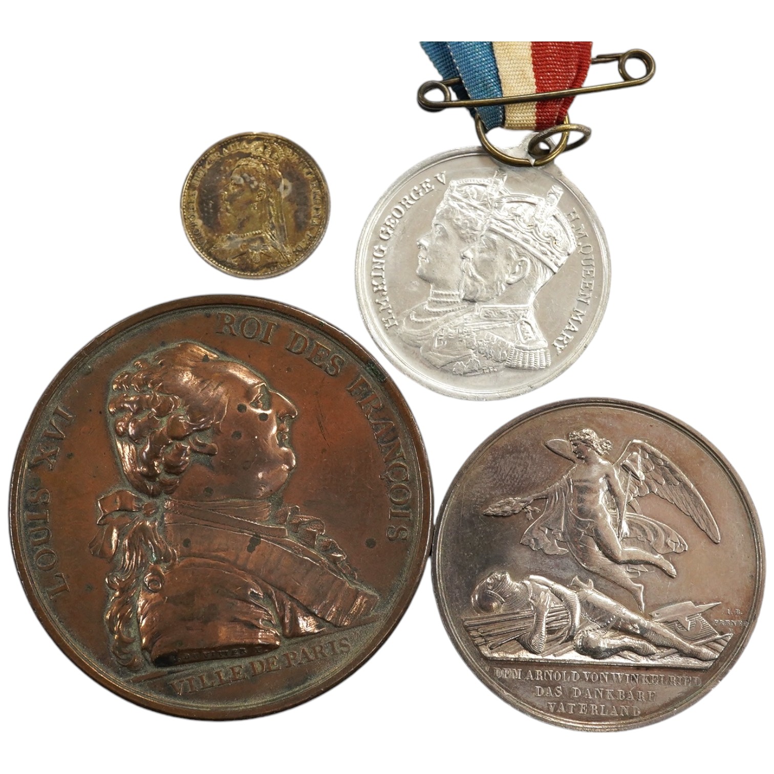 Historical medals and a group of coins